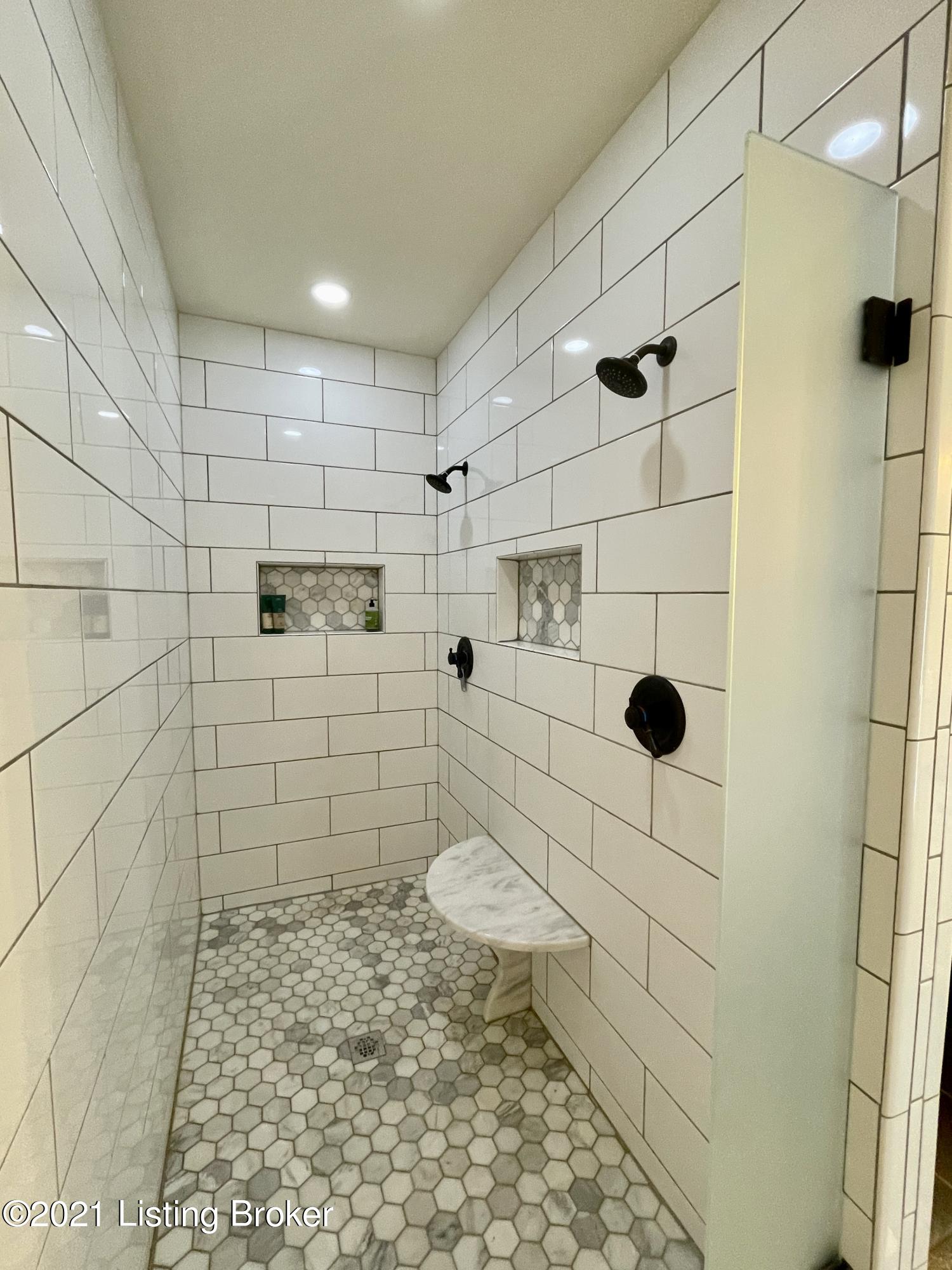 1409 Optimist Road Elizabethtown, KY 42701 - Photo 43 of 83 huge marble walk-in shower with double shower heads and bench