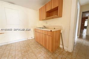 2228 Southwest 2nd Street Miami, FL 33135 - Photo 13 of 19 a view of a storage & utility room with a sink