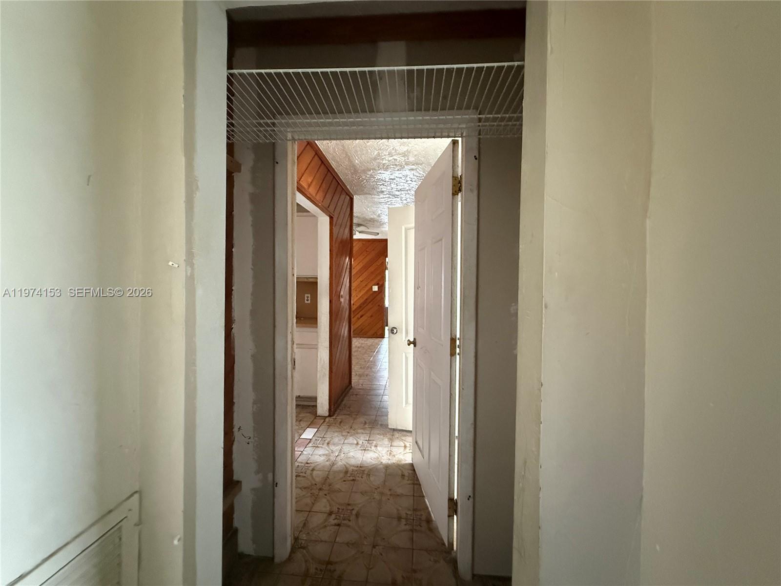 2228 Southwest 2nd Street Miami, FL 33135 - Photo 19 of 19 a view of hallway with wooden door