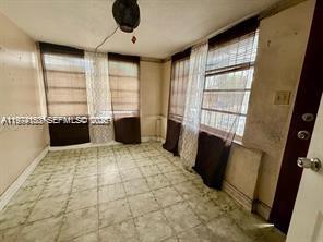 2228 Southwest 2nd Street Miami, FL 33135 - Photo 4 of 19 a view of an empty room with a window