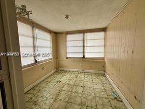 2228 Southwest 2nd Street Miami, FL 33135 - Photo 5 of 19 a bathroom with a shower and a bathtub