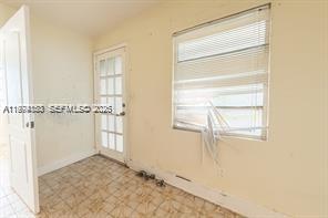 2228 Southwest 2nd Street Miami, FL 33135 - Photo 10 of 19 a view of a window in an empty room