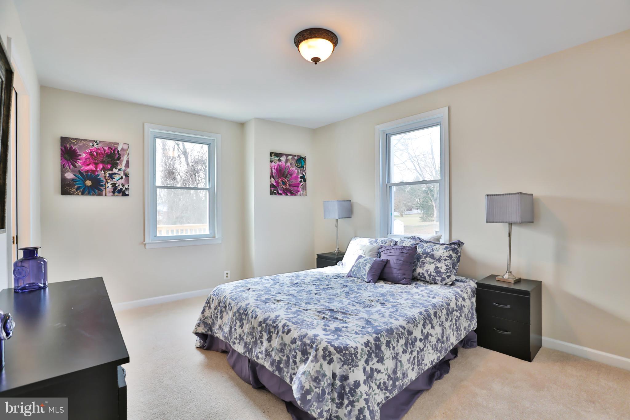 4115 Klausmier Road Baltimore, MD 21236 - Photo 14 of 30 a bedroom with a bed and a window