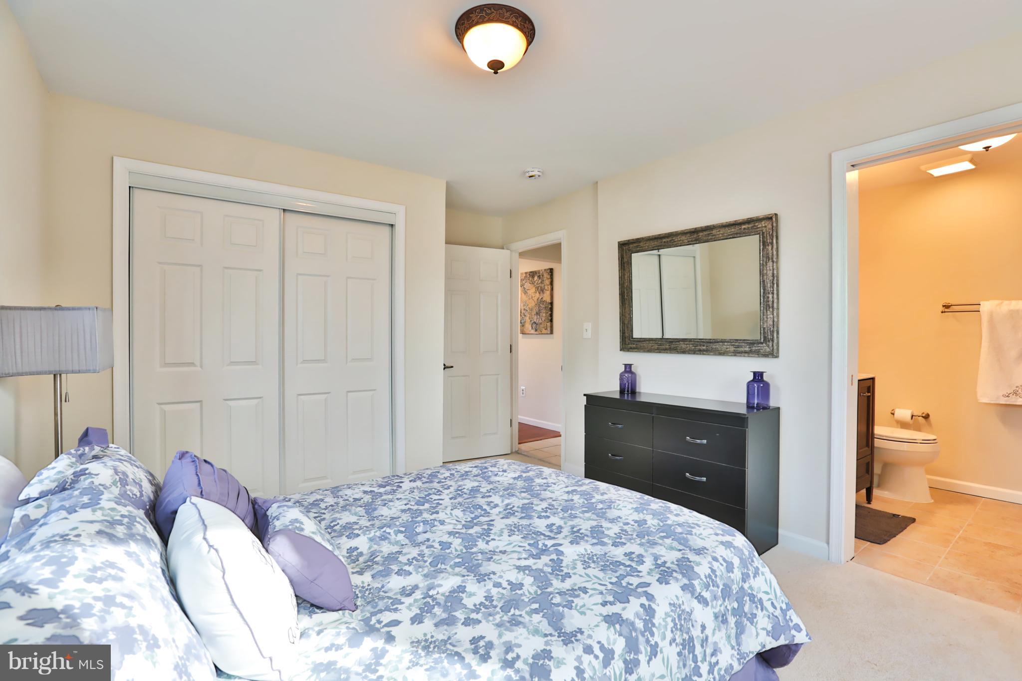 4115 Klausmier Road Baltimore, MD 21236 - Photo 17 of 30 a bedroom with a bed and a dresser