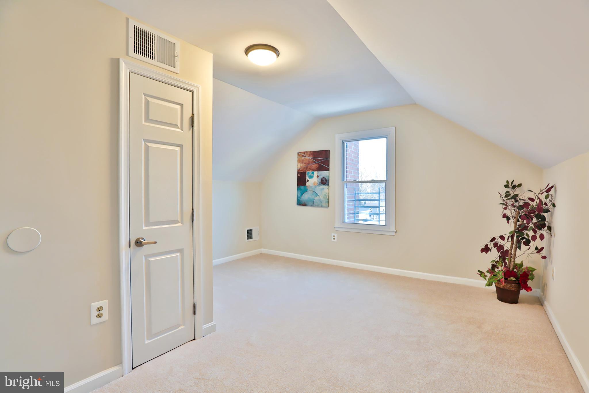 4115 Klausmier Road Baltimore, MD 21236 - Photo 24 of 30 an empty room with windows and closet