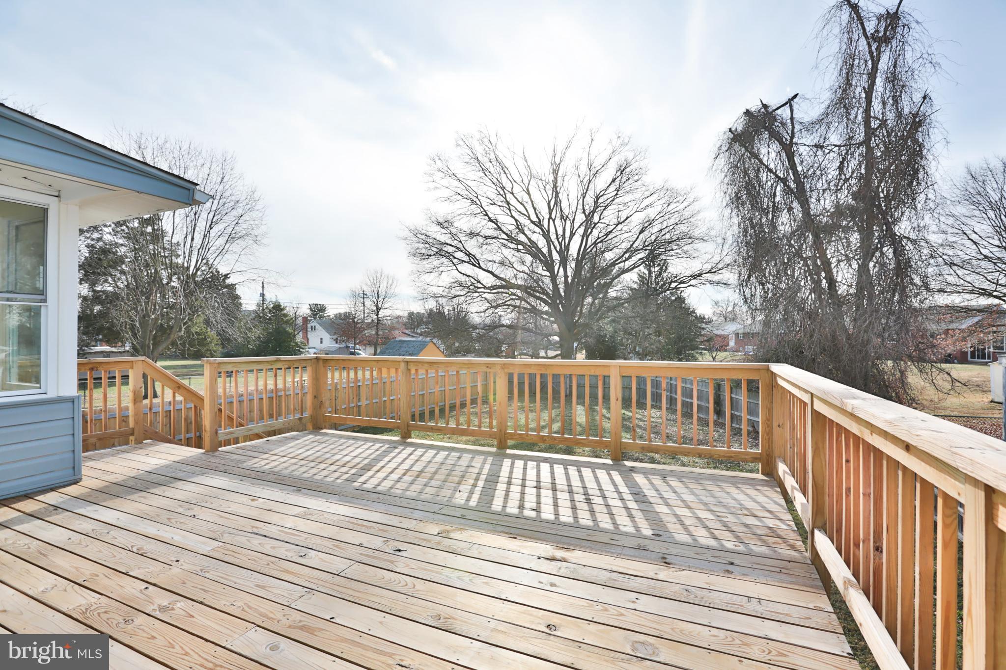 4115 Klausmier Road Baltimore, MD 21236 - Photo 27 of 30 a balcony with wooden floor and fence