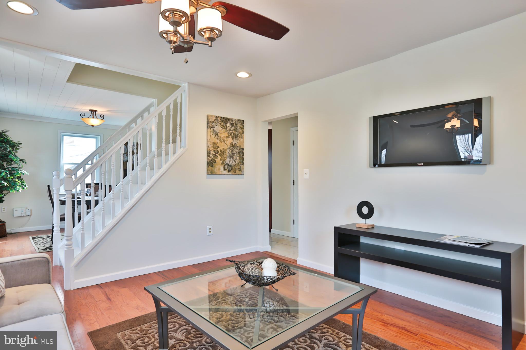4115 Klausmier Road Baltimore, MD 21236 - Photo 5 of 30 a living room with furniture and a flat screen tv