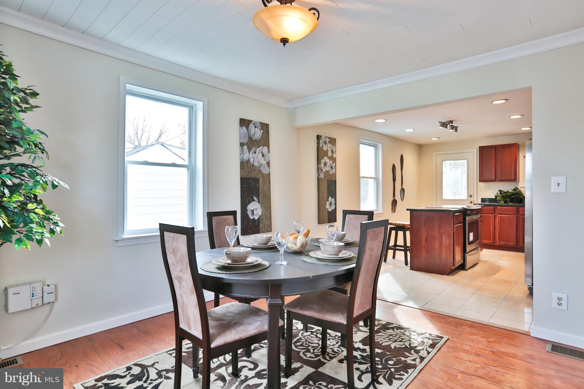 4115 Klausmier Road Baltimore, MD 21236 - Photo 6 of 30 a view of a dining room with furniture window and wooden floor