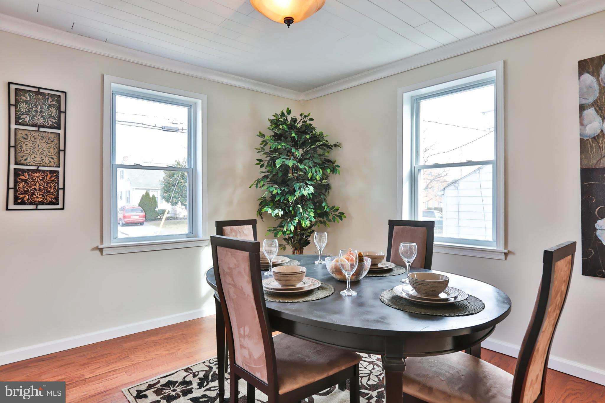 4115 Klausmier Road Baltimore, MD 21236 - Photo 7 of 30 a view of a dining room with furniture window and outside view