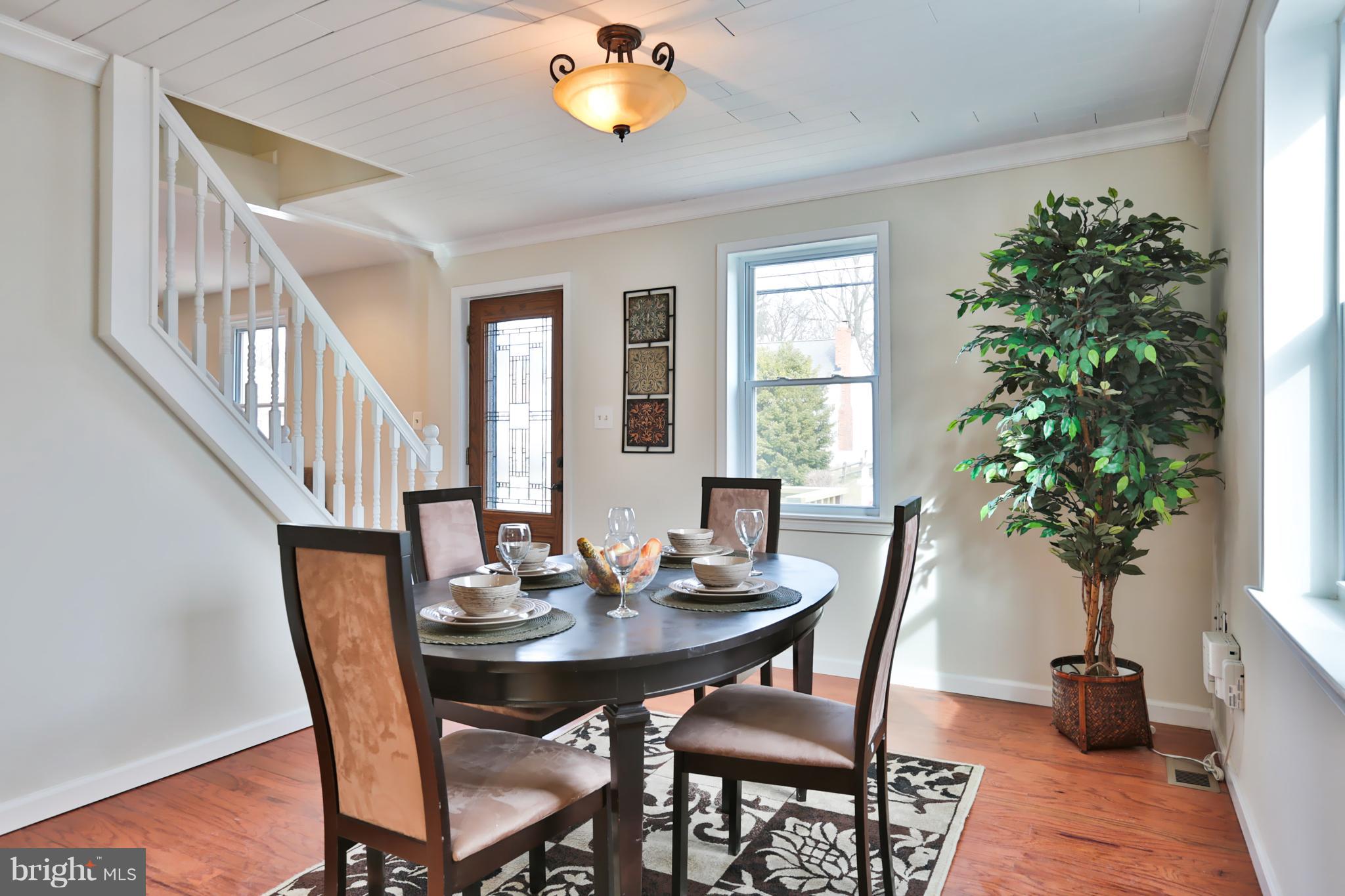 4115 Klausmier Road Baltimore, MD 21236 - Photo 8 of 30 a view of a dining room with furniture window and wooden floor