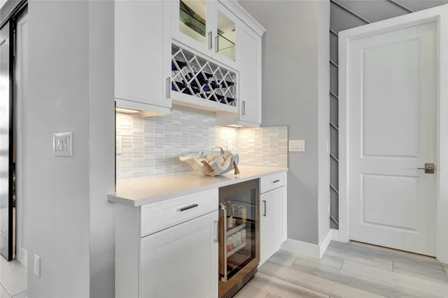 a view of a living room and dining room