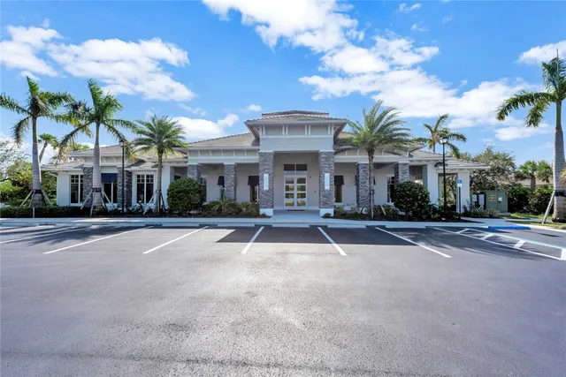 an aerial view of a house with a garden and plants