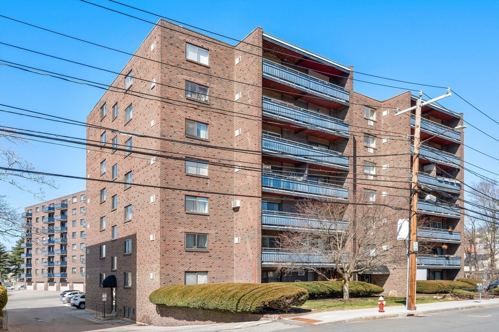 32 Whites Avenue, Unit E441 Watertown, MA 02472 - Photo 32 of 34 a front view of a building