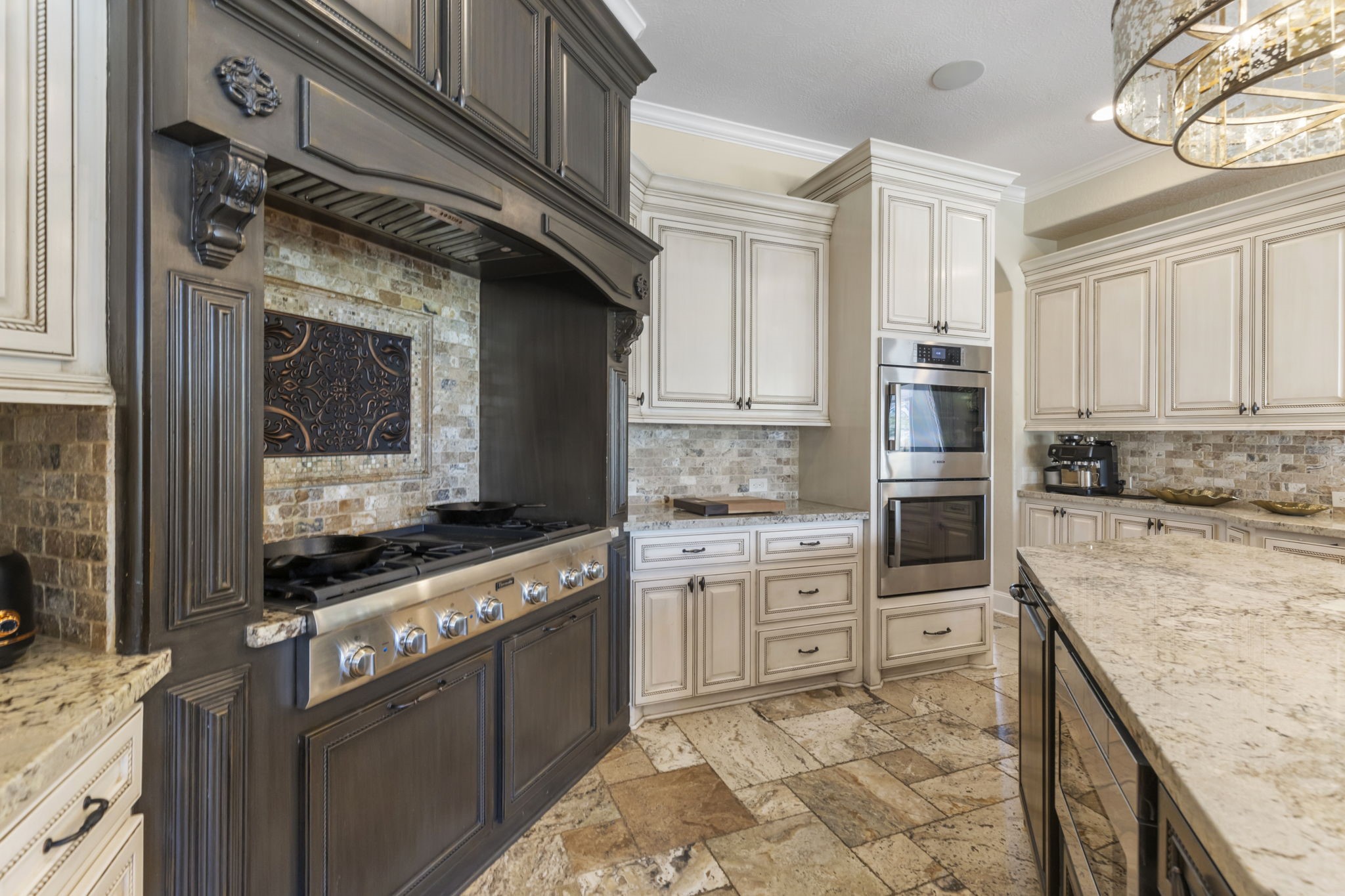13 Pleasant Shadows Drive Spring, TX 77389 - Photo 14 of 50 a kitchen with granite countertop a stove top oven and cabinets
