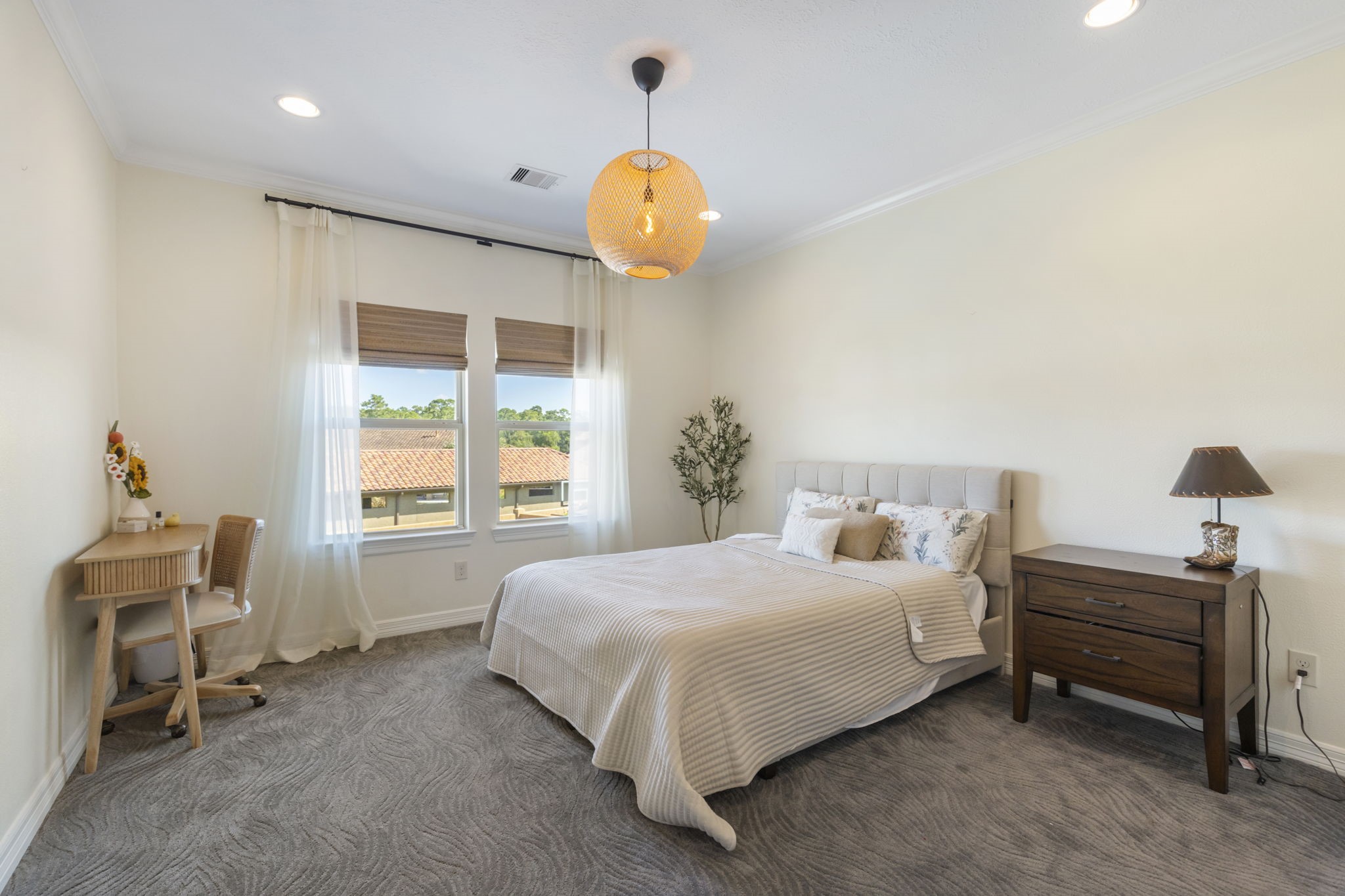 13 Pleasant Shadows Drive Spring, TX 77389 - Photo 24 of 50 a bedroom with a bed and a window