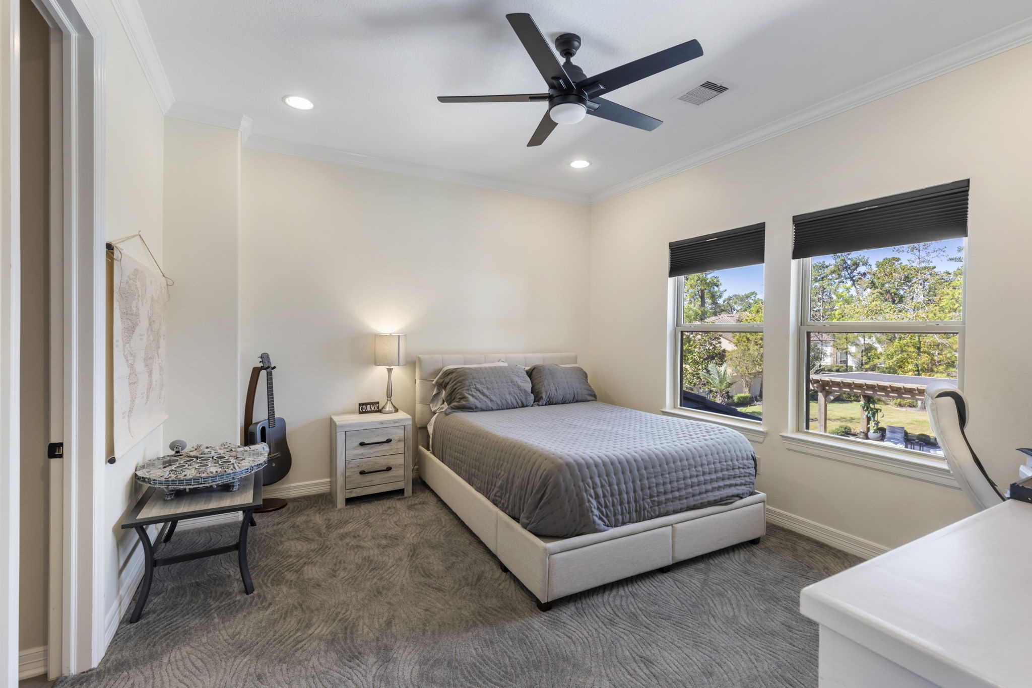 13 Pleasant Shadows Drive Spring, TX 77389 - Photo 25 of 50 a bed room with a bed and a window