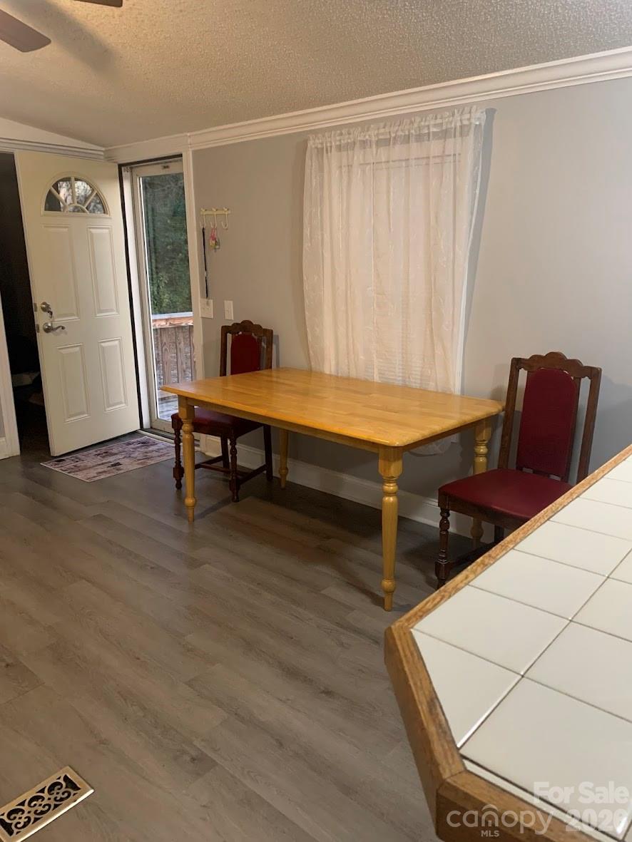 2595 Southmont Road Iron Station, NC 28080 - Photo 2 of 10 a room with pool table and windows