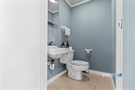 154 Talcottville Road Vernon, CT 06066 - Photo 7 of 9 a bathroom with a toilet sink and mirror