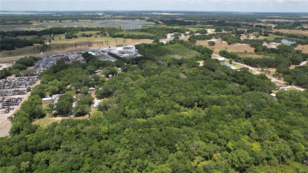 Moose Lodge Road Bartow, FL 33830 - Photo 3 of 3 an aerial view of residential houses with outdoor space and trees