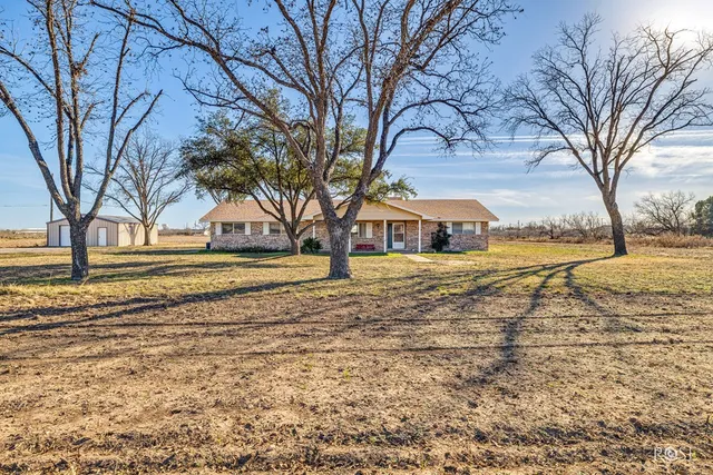 a front view of a house with ocean view