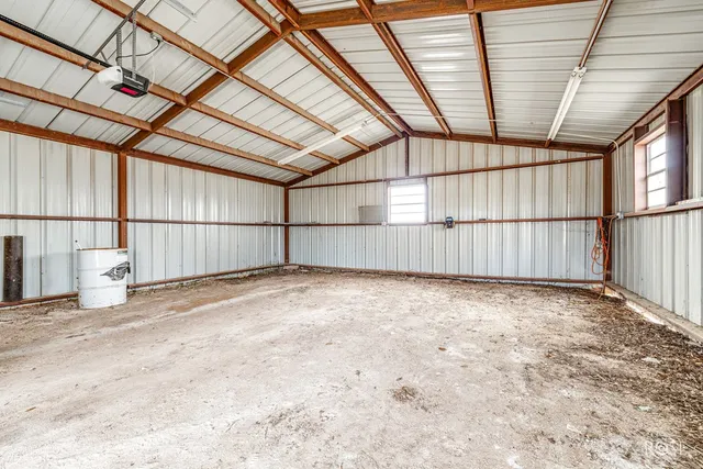 a view of road with large trees