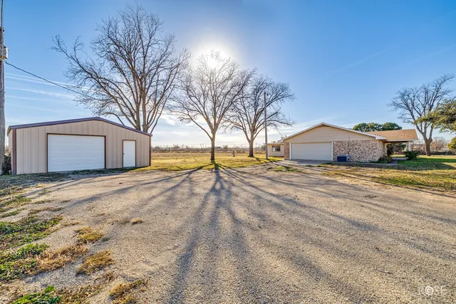 a house with trees in front of it