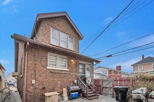a front view of a house with parking