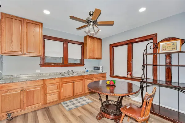 a very nice looking kitchen with a large window