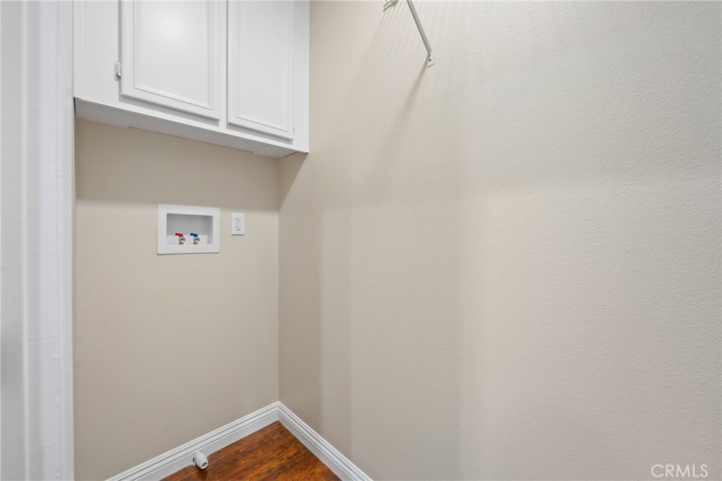 219 Chaumont Circle Lake Forest, CA 92610 - Photo 15 of 56 Built-in shelving provides extra storage for laundry essentials.