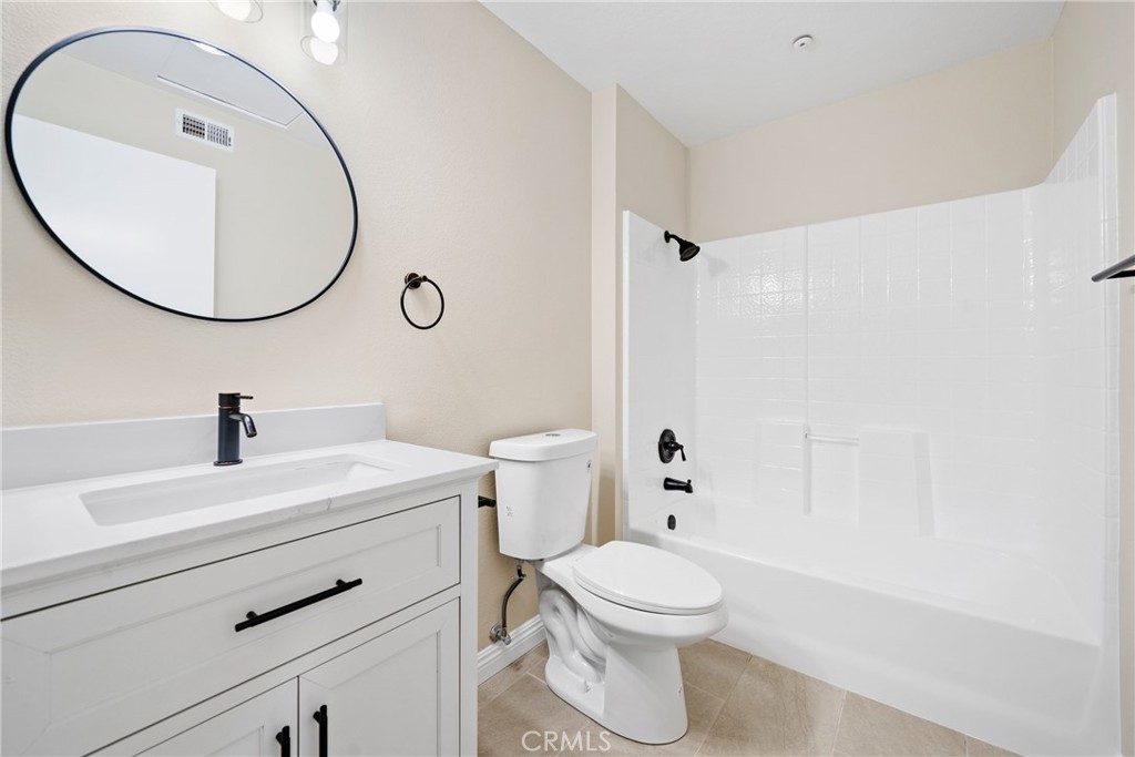 219 Chaumont Circle Lake Forest, CA 92610 - Photo 24 of 56 The remodeled hallway bath features modern updates and a clean design.