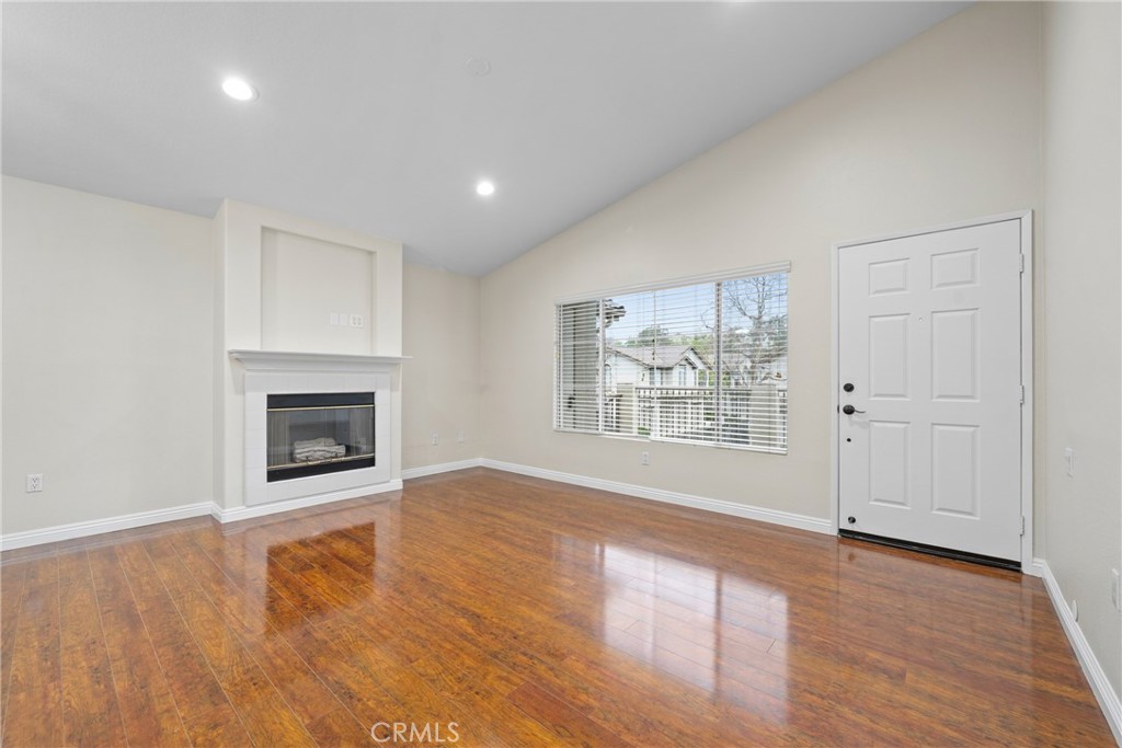 219 Chaumont Circle Lake Forest, CA 92610 - Photo 7 of 56 The spacious family and dining room welcome you with high ceilings and a cozy fireplace.