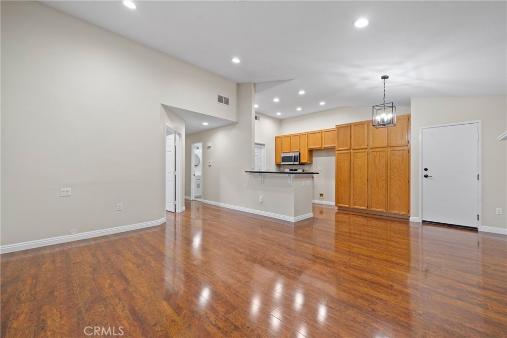 219 Chaumont Circle Lake Forest, CA 92610 - Photo 10 of 56 Family room before virtual staging!