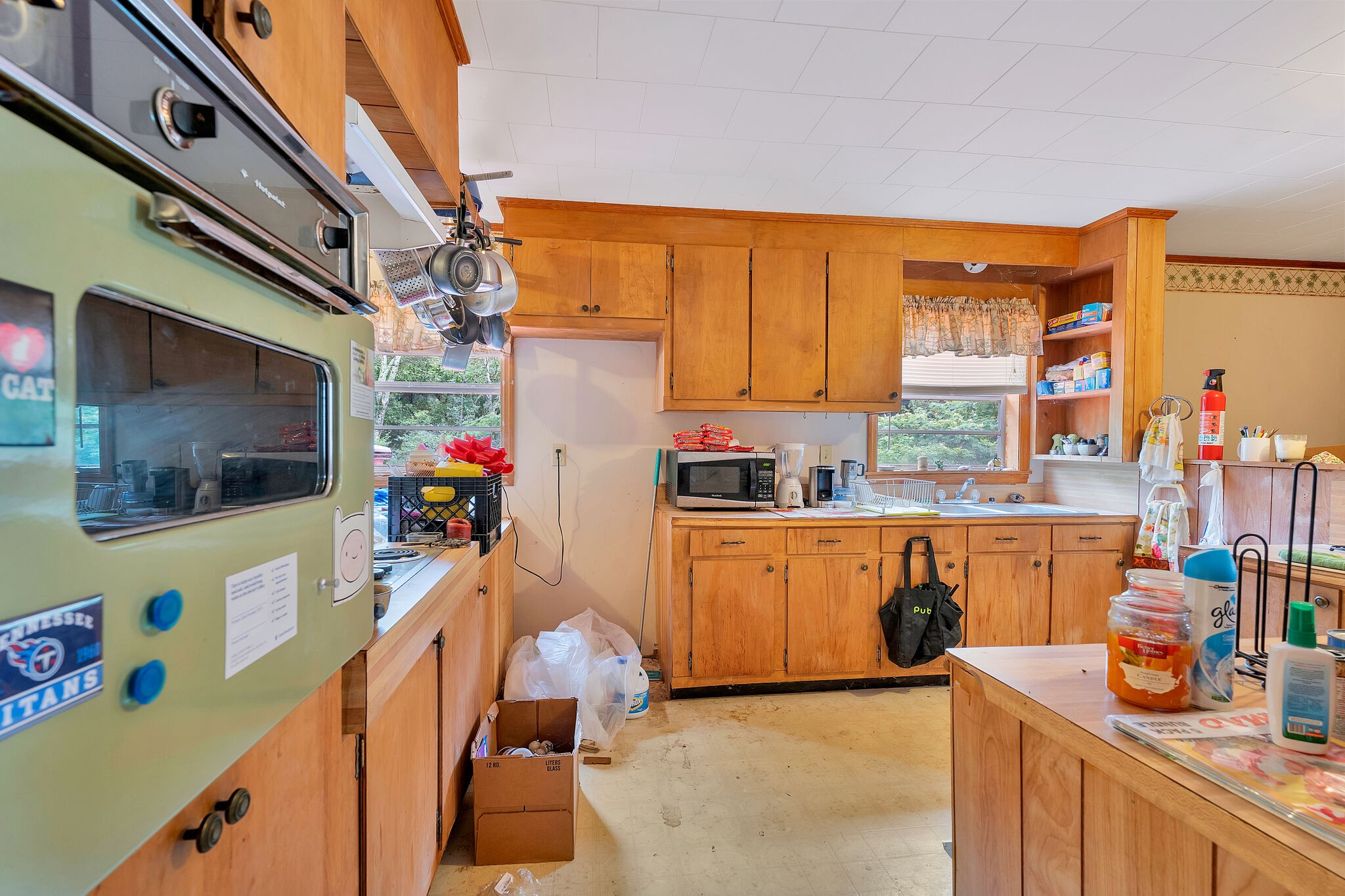 1205 Main Street Altamont, TN 37301 - Photo 20 of 51 a kitchen with stainless steel appliances a stove a sink and a refrigerator