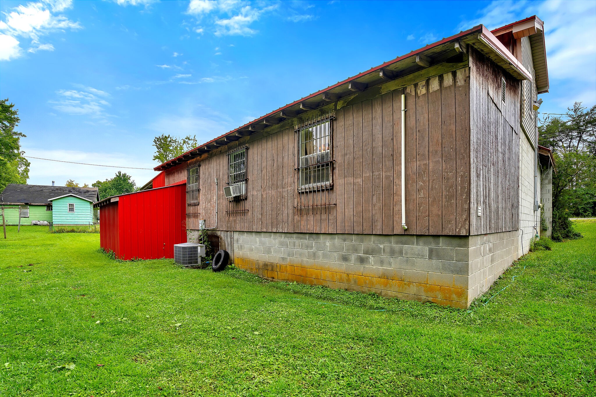 1205 Main Street Altamont, TN 37301 - Photo 47 of 51 a backyard of a house with wooden fence and large trees
