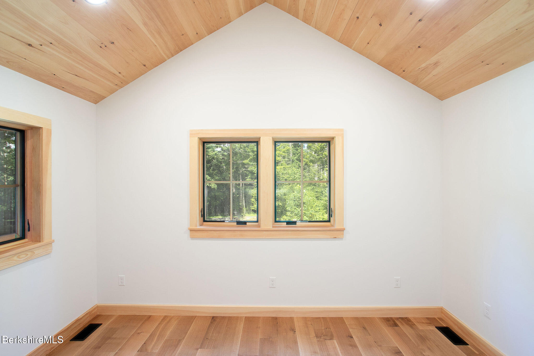 1427 Hewins Street Sheffield, MA 01222 - Photo 17 of 29 a view of an empty room with a window