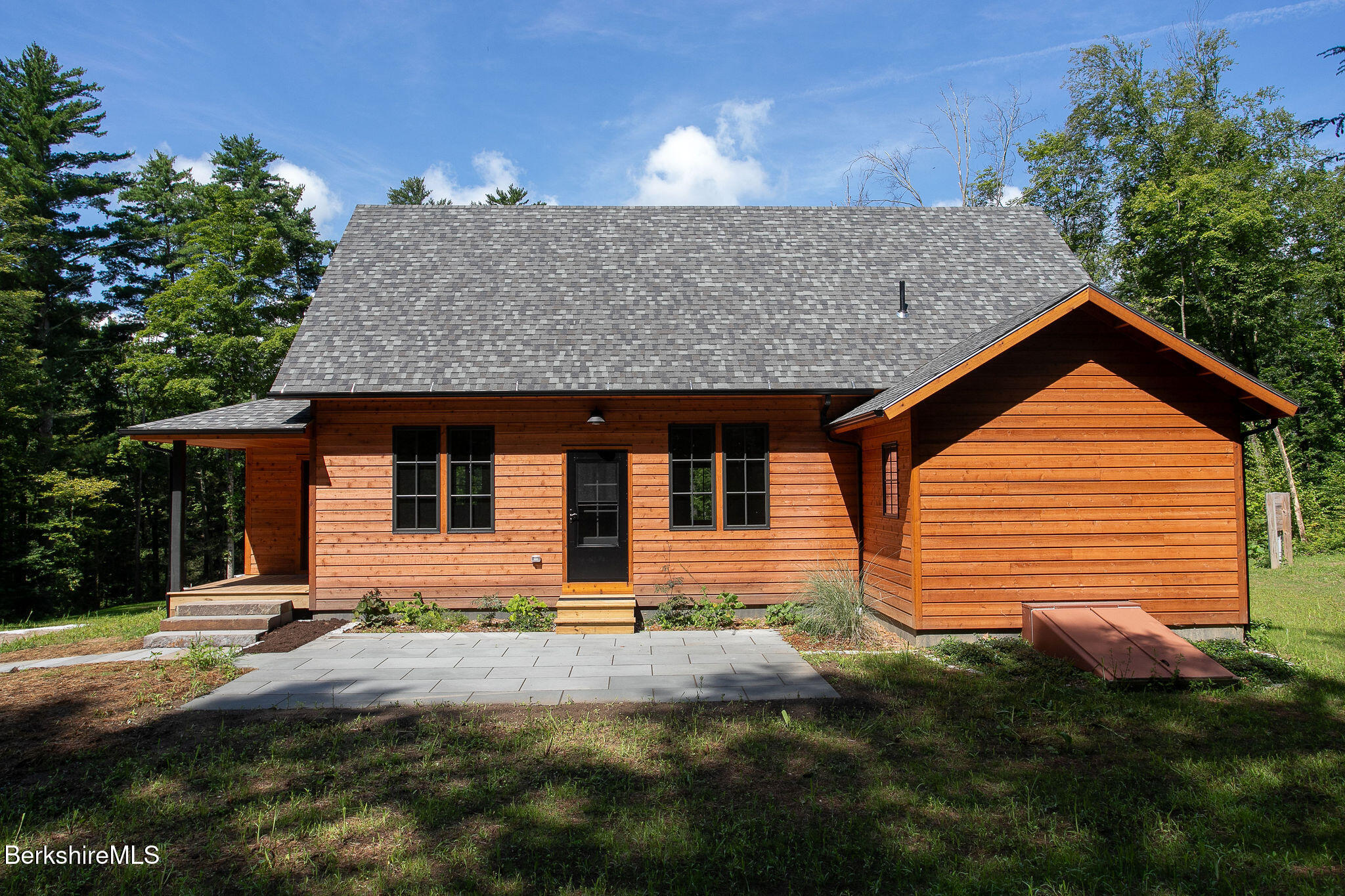 1427 Hewins Street Sheffield, MA 01222 - Photo 3 of 29 a front view of a house with a yard