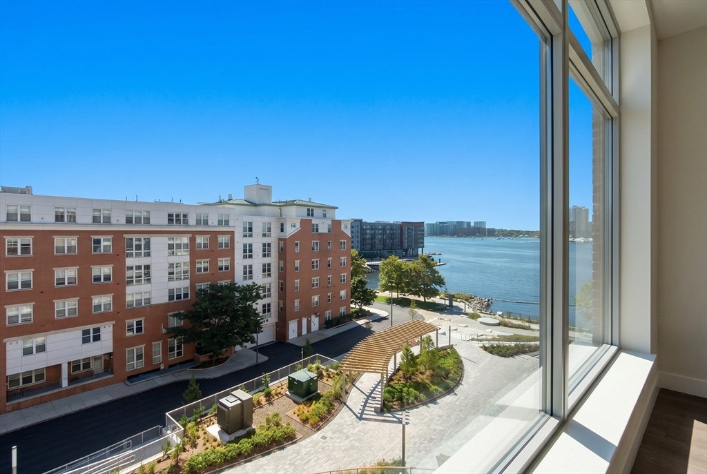 99 Sumner Street, Unit 606 Boston, MA 02128 - Photo 1 of 22 a view of a balcony with an ocean view