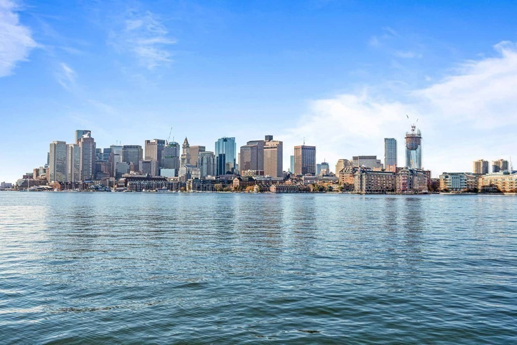 99 Sumner Street, Unit 606 Boston, MA 02128 - Photo 22 of 22 a view of a city with ocean