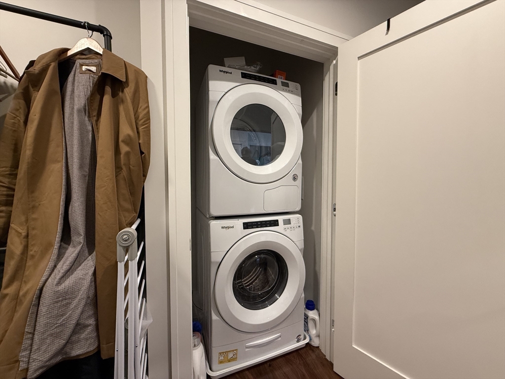 99 Sumner Street, Unit 606 Boston, MA 02128 - Photo 10 of 22 a close up view of a washer and dryer