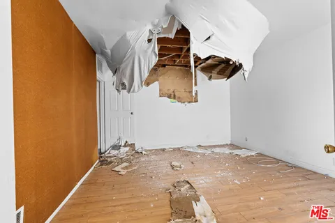 a view of a room with rack on the wall