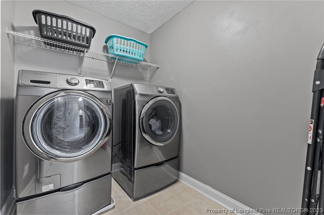 155 Dicks Hill Road Carthage, NC 28327 - Photo 23 of 47 a utility room with dryer and washer