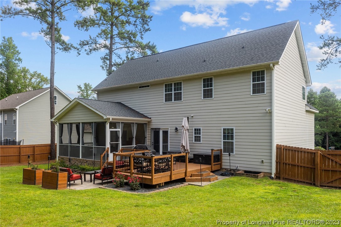155 Dicks Hill Road Carthage, NC 28327 - Photo 42 of 47 a view of a house with a yard and a patio