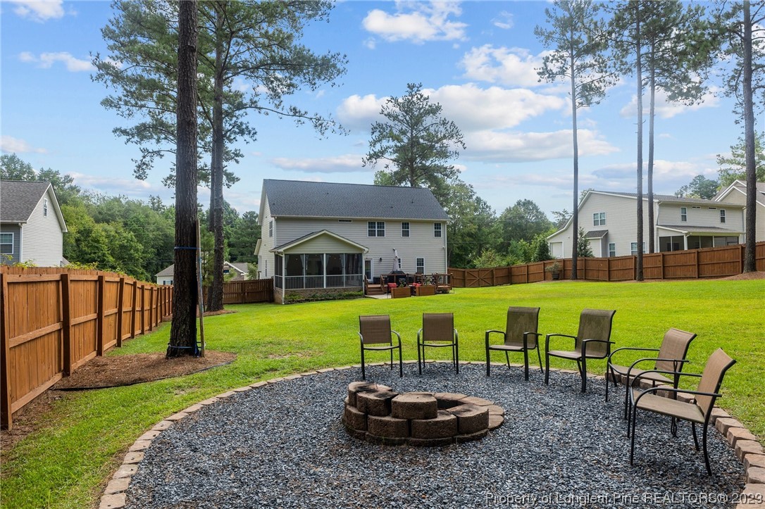 155 Dicks Hill Road Carthage, NC 28327 - Photo 45 of 47 a view of a swimming pool and lounge chairs in back yard