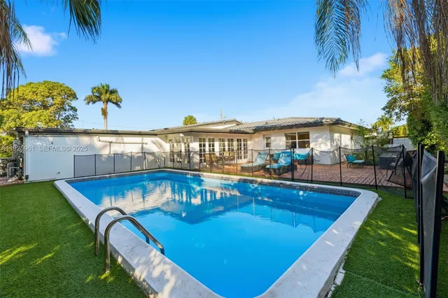 swimming pool view with plants