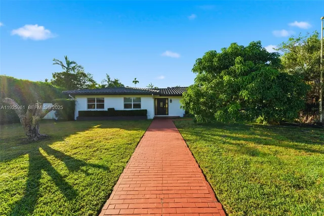 a view of house with garden