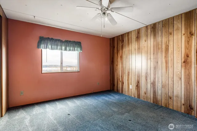 a view of a bathroom with a shower and a toilet