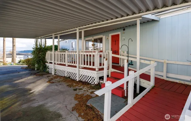 a view of staircase with a white roof and stairs