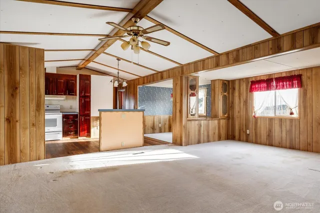 a view of a room with wooden walls