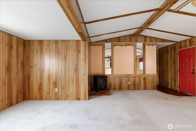 a kitchen with kitchen island a sink stainless steel appliances and cabinets