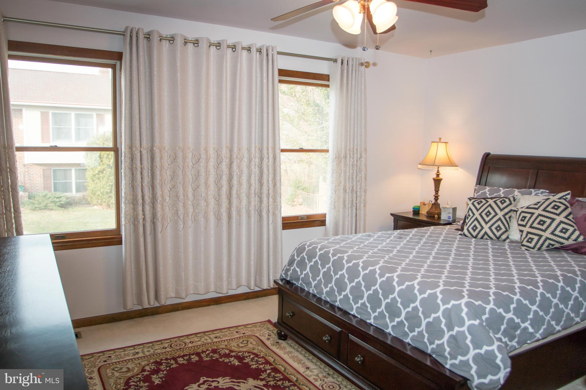 1303 Westburn Road Baltimore, MD 21228 - Photo 18 of 26 Bedroom (Master) with ceiling fan & lights